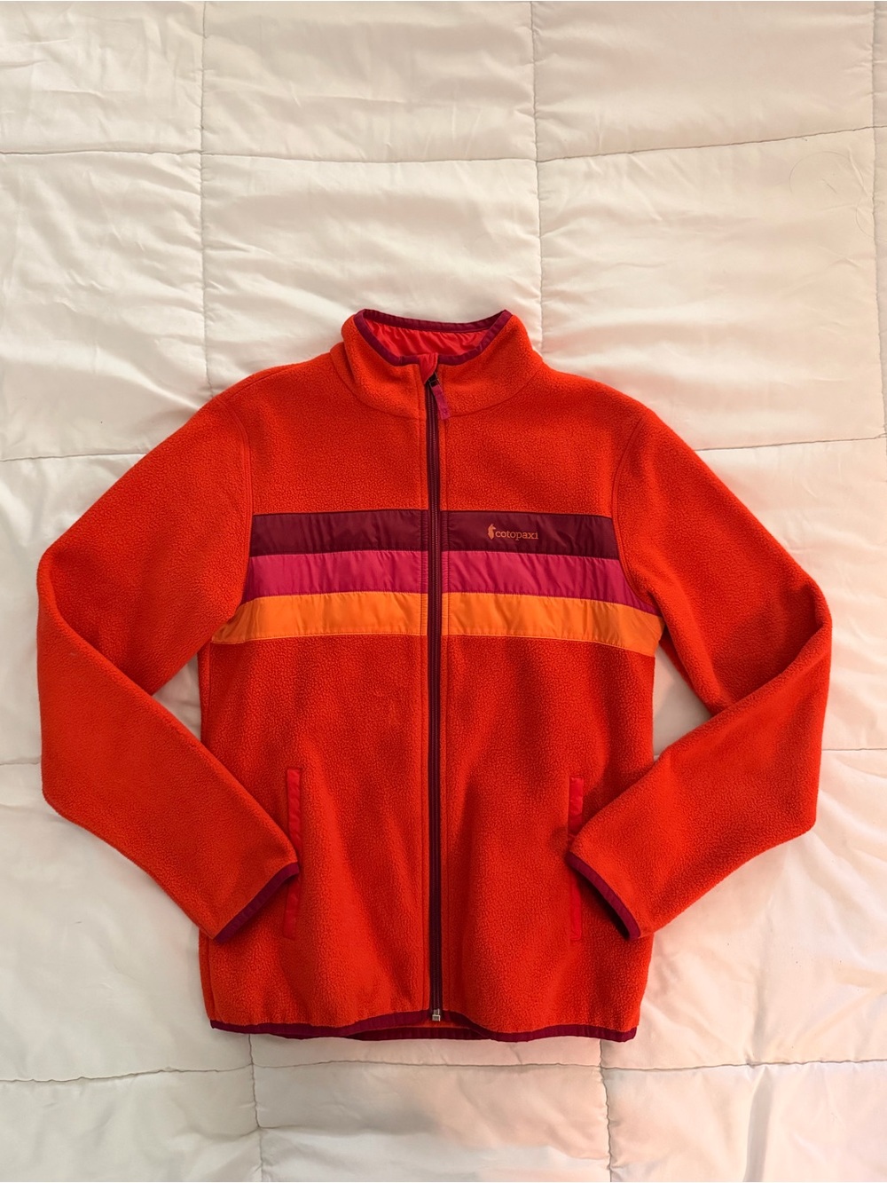 cotopaxi Orange Fleece Jacket with Pink and Yellow Stripe Accents